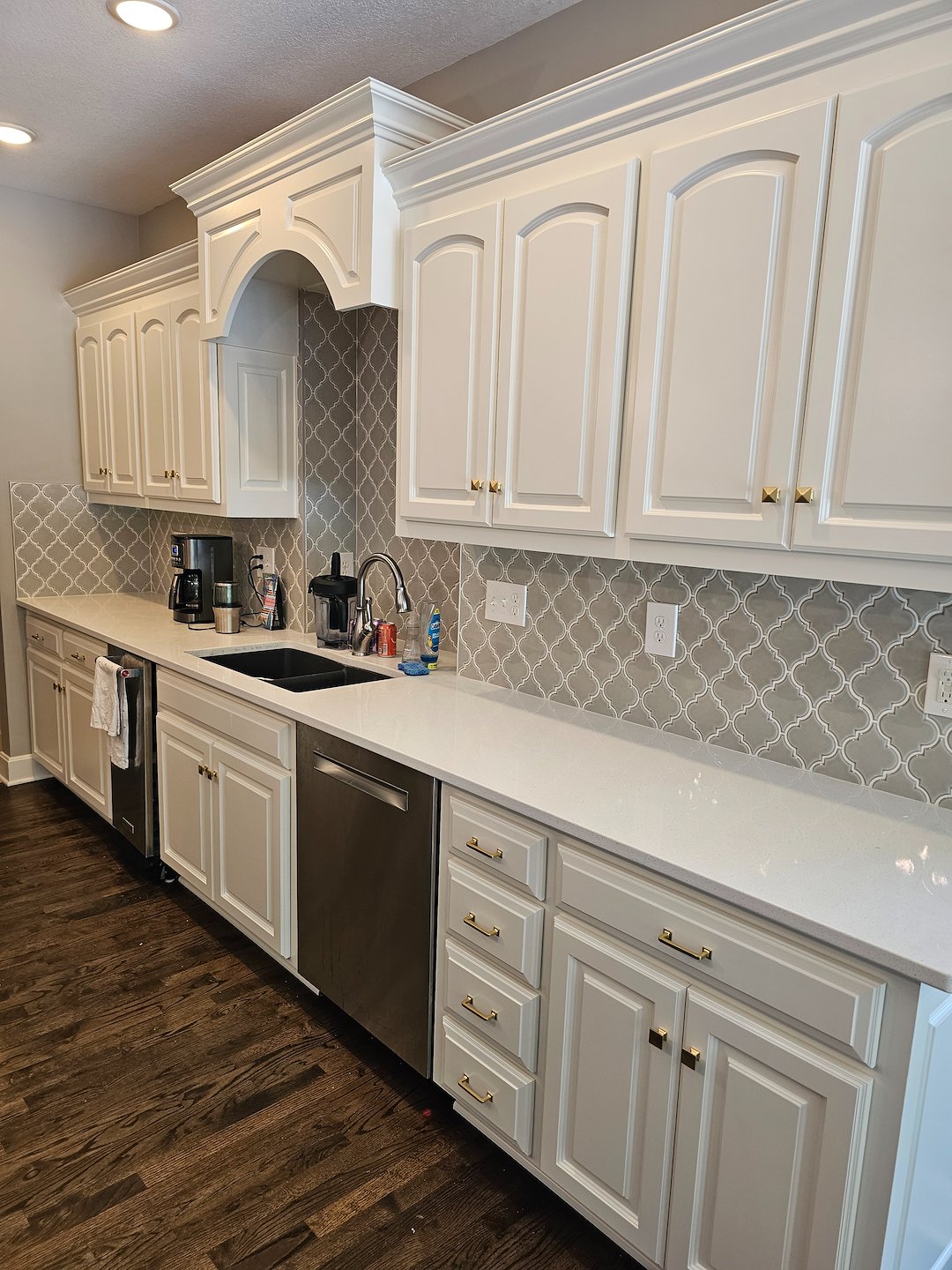 Beautiful kitchen makeover with iron ore accent for the island and built-ins 